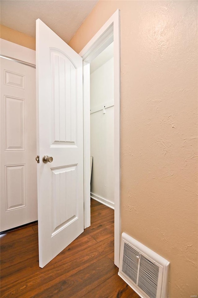 791 N Adams Ave N, Lebanon, MO 65536 - hallway featuring dark wood finished floors