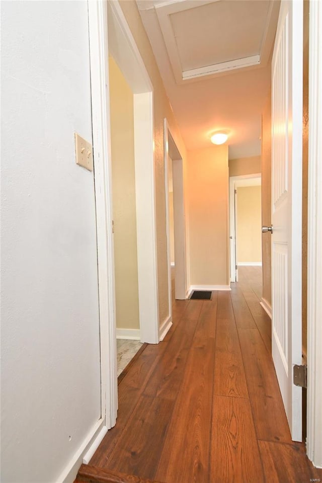 791 N Adams Ave N, Lebanon, MO 65536 - hall with attic access, hardwood / wood-style flooring, and baseboards