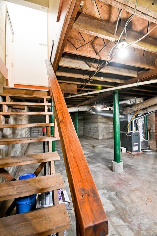 791 N Adams Ave N, Lebanon, MO 65536 - staircase with unfinished concrete flooring and heating unit