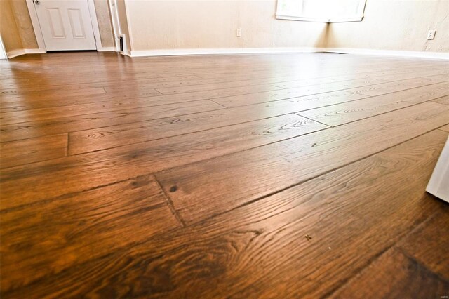 791 N Adams Ave N, Lebanon, MO 65536 - detailed view of wood finished floors and baseboards