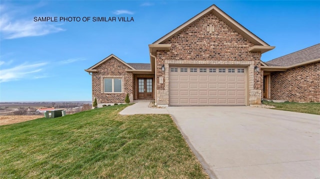 2411 Sunset Ridge Dr, Columbia, IL 62236 - view of front of home featuring an attached garage, concrete driveway, a front lawn, brick siding, and roof with shingles