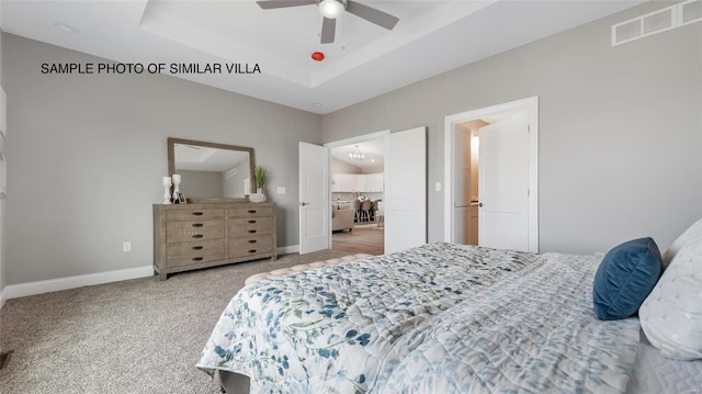 2411 Sunset Ridge Dr, Columbia, IL 62236 - carpeted bedroom with baseboards, a raised ceiling, and a ceiling fan