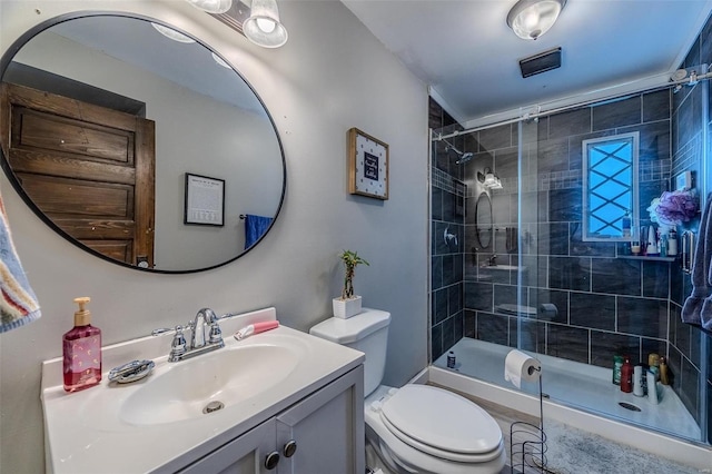 607 N Jackson St, Salem, MO 65560 - bathroom with a tile shower, toilet, and vanity