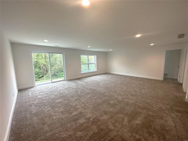 4947 Butler Hill Rd, Saint Louis, MO 63128 - carpeted spare room with baseboards and recessed lighting
