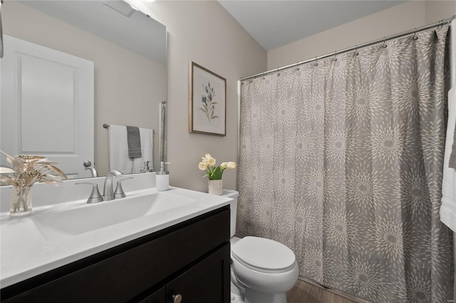 4947 Butler Hill Rd, Saint Louis, MO 63128 - full bath with toilet, vanity, and wood finished floors