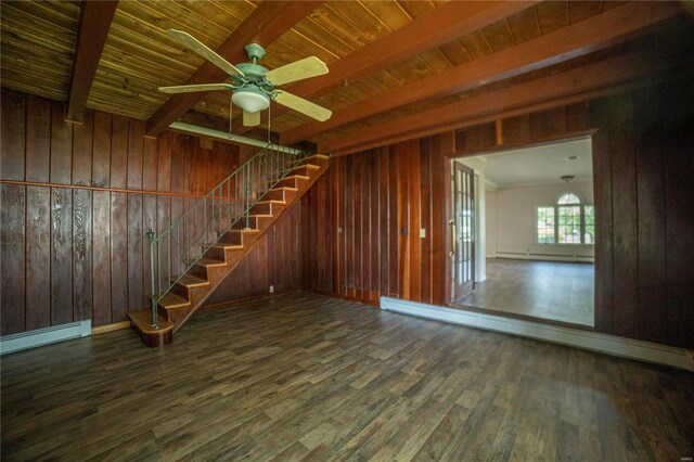 400 W W, New London, MO 63459 - unfurnished living room featuring wooden walls, ceiling fan, wood finished floors, beamed ceiling, and a baseboard radiator