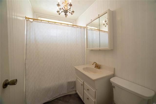 400 W W, New London, MO 63459 - bathroom featuring toilet, vanity, and a shower with shower curtain