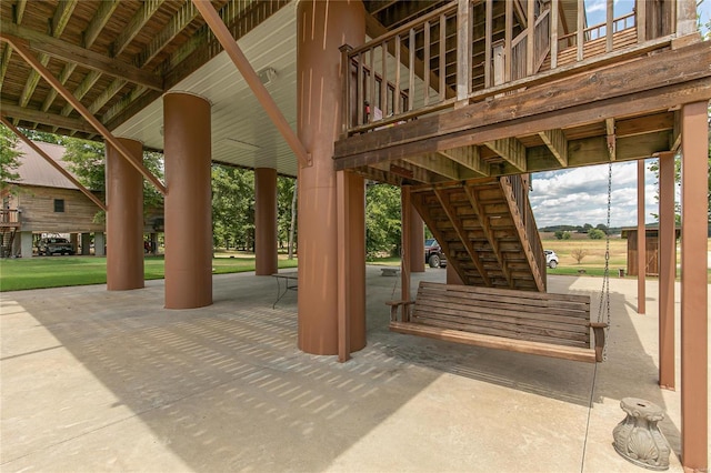 view of patio / terrace featuring stairs
