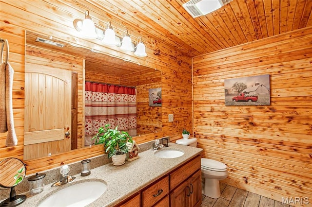 1901 River Valley Rd, Doniphan, MO 63935 - bathroom featuring toilet, double vanity, wooden walls, wood ceiling, and a shower with shower curtain