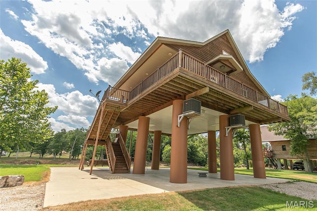 1901 River Valley Rd, Doniphan, MO 63935 - surrounding community featuring a lawn, stairway, and a patio area