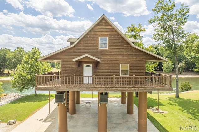 1901 River Valley Rd, Doniphan, MO 63935 - view of front of property with a front lawn, a deck with water view, a patio, and central AC unit