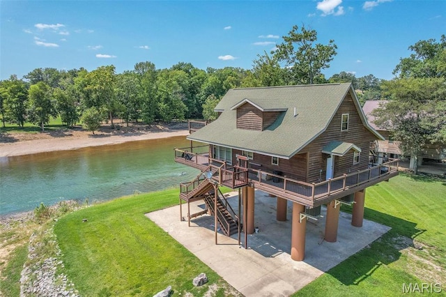 1901 River Valley Rd, Doniphan, MO 63935 - view of front of home featuring a patio area, a deck with water view, a front yard, and roof with shingles