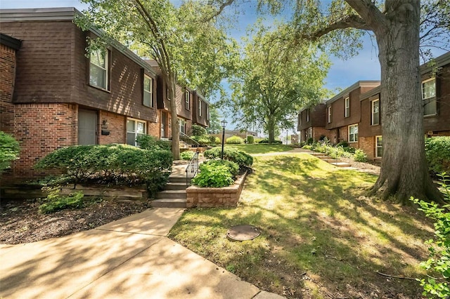 13579 Coliseum Dr Unit G, Chesterfield, MO 63017 - view of home's community featuring a residential view and a lawn