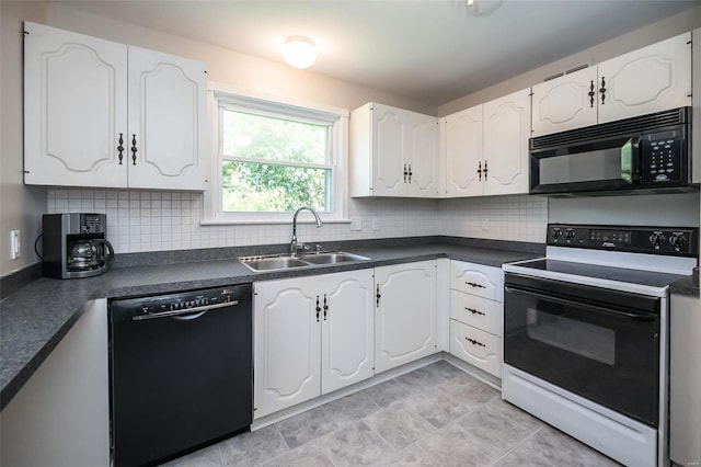 13579 Coliseum Dr Unit G, Chesterfield, MO 63017 - kitchen with black appliances, a sink, dark countertops, white cabinets, and decorative backsplash