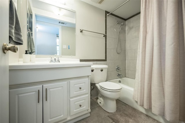13579 Coliseum Dr Unit G, Chesterfield, MO 63017 - full bathroom featuring shower / bath combo, vanity, tile patterned floors, and toilet
