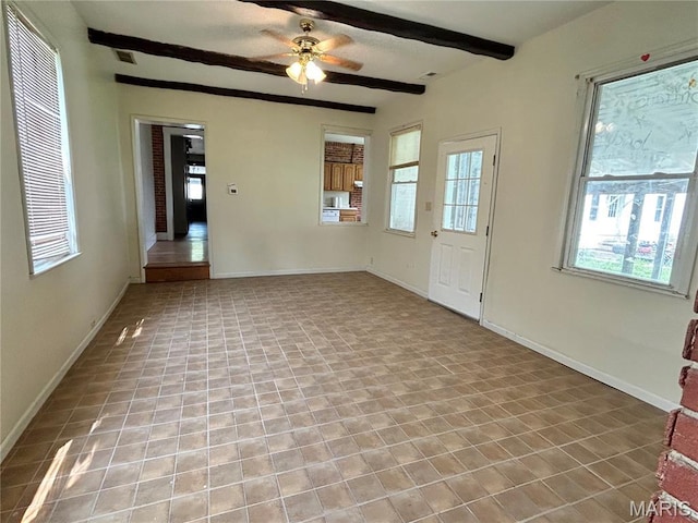 410 N Main St, Red Bud, IL 62278 - unfurnished living room with beamed ceiling, ceiling fan, and baseboards