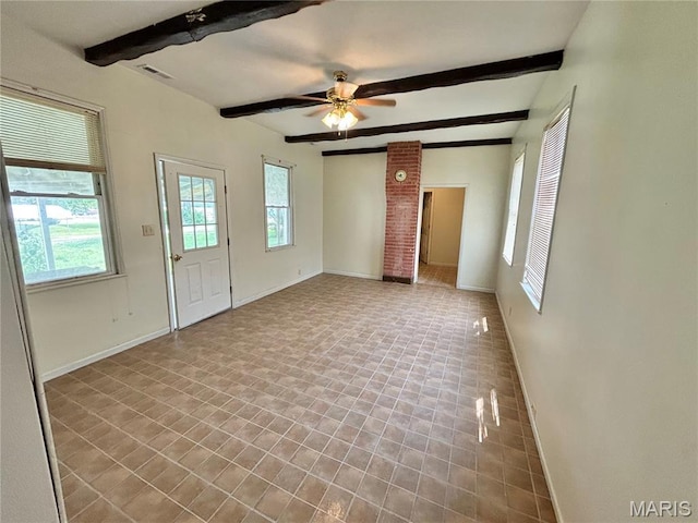 410 N Main St, Red Bud, IL 62278 - unfurnished living room featuring beamed ceiling, baseboards, and ceiling fan