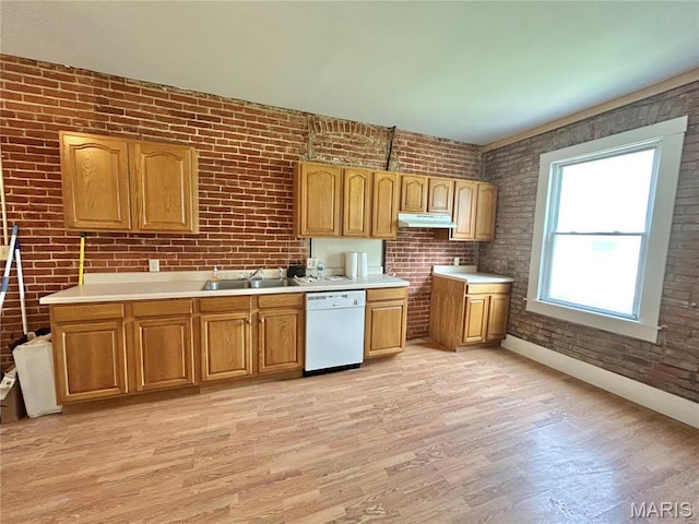 410 N Main St, Red Bud, IL 62278 - kitchen with white dishwasher, light wood-style floors, brick wall, under cabinet range hood, and a sink
