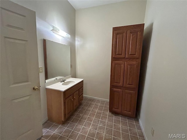 410 N Main St, Red Bud, IL 62278 - bathroom with vanity, tile patterned floors, and baseboards