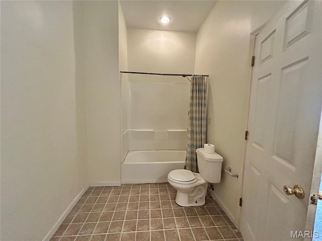 410 N Main St, Red Bud, IL 62278 - bathroom with toilet, baseboards, shower / tub combo with curtain, and tile patterned flooring