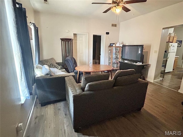 410 N Main St, Red Bud, IL 62278 - living area featuring ceiling fan, wood finished floors, and baseboards