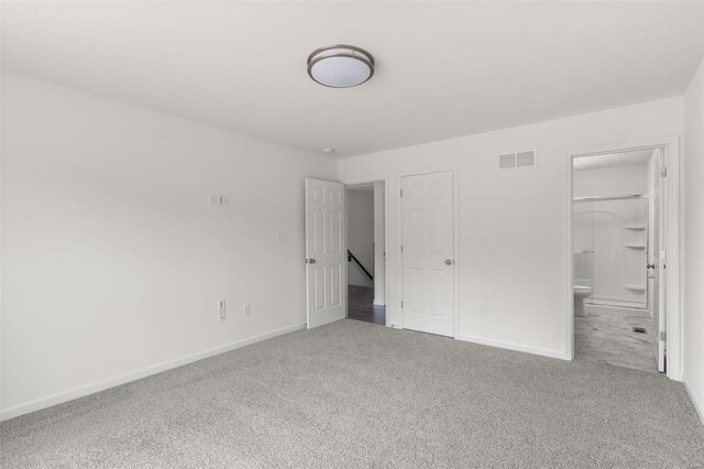 106 Harrow Dr, Ofallon, MO 63385 - unfurnished bedroom with carpet, baseboards, and ensuite bathroom