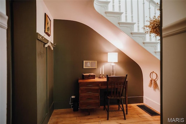 725 W Springfield St, St James, MO 65559 - office featuring hardwood / wood-style floors and arched walkways
