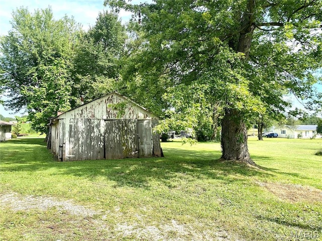 610 N Caldwell St, Middletown, MO 63359 - view of green lawn with an outbuilding