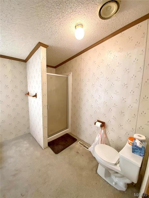 610 N Caldwell St, Middletown, MO 63359 - full bathroom with ornamental molding, toilet, a stall shower, and a textured ceiling