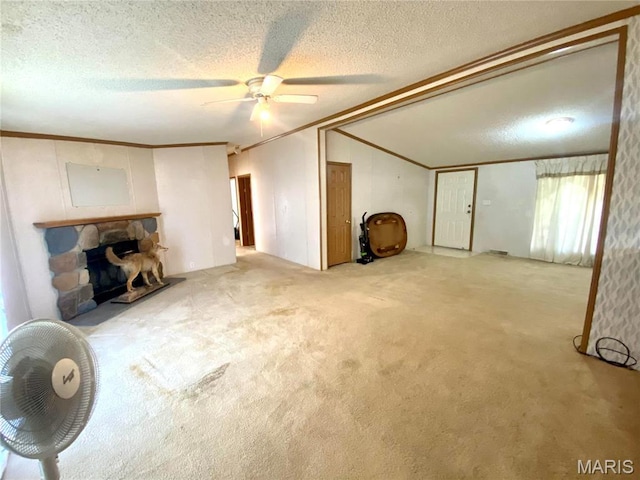 610 N Caldwell St, Middletown, MO 63359 - unfurnished living room with lofted ceiling, ornamental molding, a textured ceiling, carpet, and ceiling fan