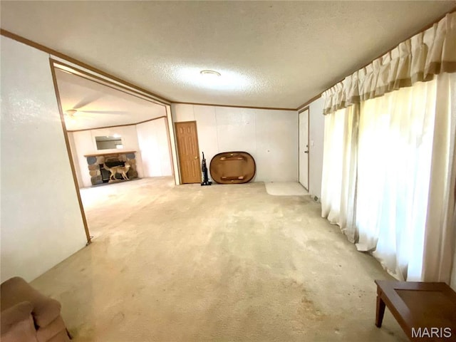 610 N Caldwell St, Middletown, MO 63359 - unfurnished living room featuring light colored carpet and a textured ceiling