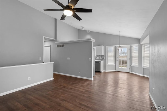 111 Aspencade Cir, Saint Peters, MO 63376 - unfurnished living room with a ceiling fan, dark wood-style flooring, baseboards, and high vaulted ceiling