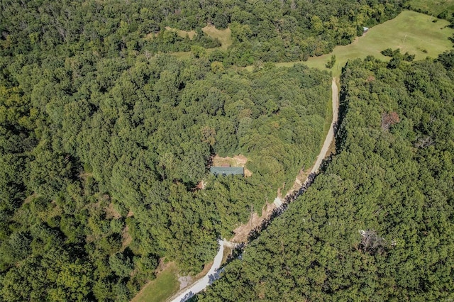 28 Acacia Dr, Conway, MO 65632 - aerial view of property and surrounding area with a heavily wooded area