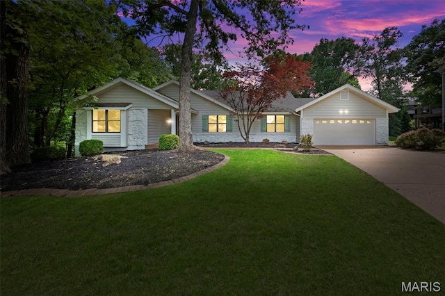 6 Freedom Way, Saint Charles, MO 63303 - view of front of property featuring an attached garage, stone siding, driveway, and a front yard