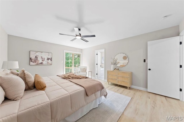 6 Freedom Way, Saint Charles, MO 63303 - bedroom with light wood-style flooring, ceiling fan, ensuite bathroom, and baseboards