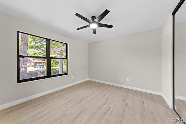 6 Freedom Way, Saint Charles, MO 63303 - spare room with light wood-style floors, baseboards, and ceiling fan