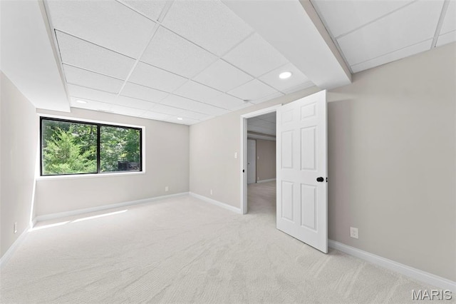 6 Freedom Way, Saint Charles, MO 63303 - spare room with light carpet, baseboards, recessed lighting, and a paneled ceiling