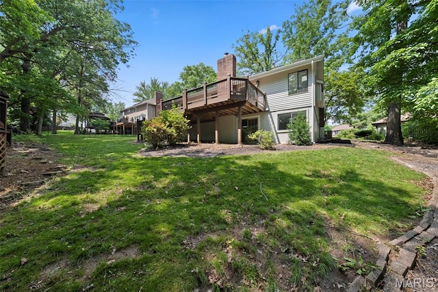 6 Freedom Way, Saint Charles, MO 63303 - back of house with a wooden deck, a lawn, and a chimney