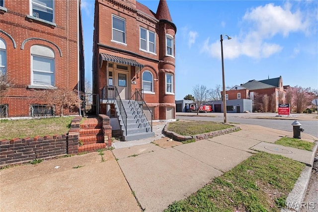 2901 Magnolia Ave, Saint Louis, MO 63118 - doorway to property with brick siding and a residential view