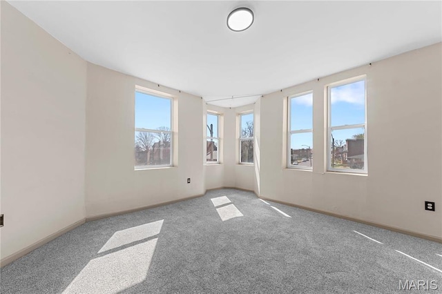 2901 Magnolia Ave, Saint Louis, MO 63118 - carpeted spare room featuring baseboards