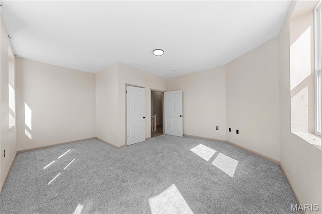 2901 Magnolia Ave, Saint Louis, MO 63118 - unfurnished bedroom featuring carpet floors and baseboards