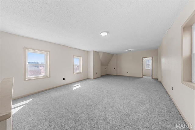 2901 Magnolia Ave, Saint Louis, MO 63118 - spare room with carpet floors, a textured ceiling, and baseboards