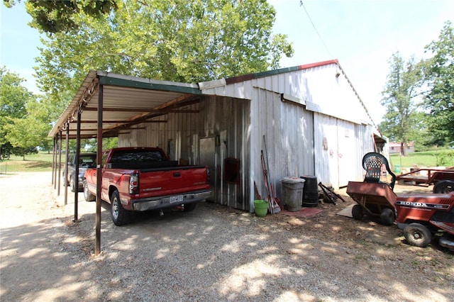12433 State Route 101, Caulfield, MO 65626 - view of car parking with a carport and a pole building