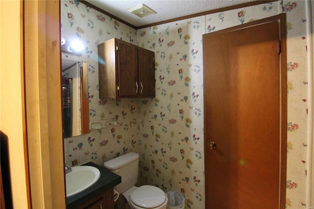 12433 State Route 101, Caulfield, MO 65626 - bathroom with wallpapered walls, toilet, crown molding, and vanity