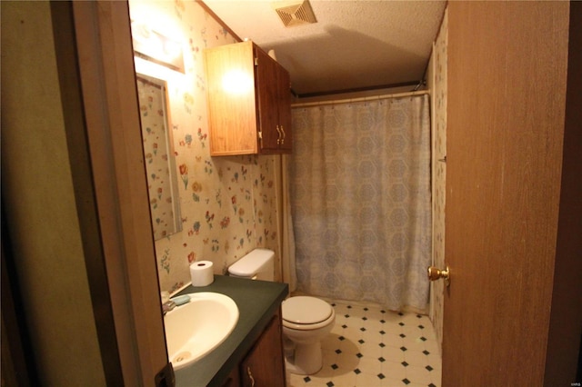 12433 State Route 101, Caulfield, MO 65626 - full bathroom featuring vanity, a shower with shower curtain, toilet, tile patterned floors, and wallpapered walls