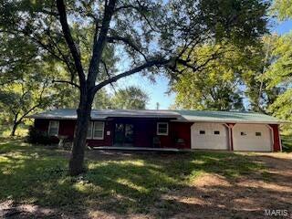 1742 Date Dr, Summersville, MO 65571 - ranch-style house featuring dirt driveway and an attached garage