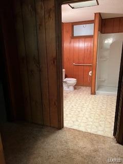 1742 Date Dr, Summersville, MO 65571 - bathroom featuring wood walls and toilet
