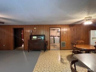 1742 Date Dr, Summersville, MO 65571 - dining space with wood walls and a ceiling fan