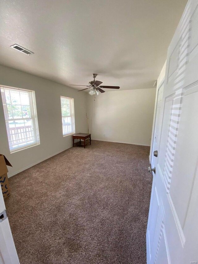 37 County Road 343, Benton Township, MO 65626 - unfurnished bedroom featuring carpet floors and ceiling fan