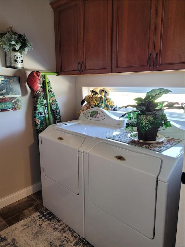 10359 Bounds Rd, Shipman, IL 62685 - washroom featuring cabinet space, separate washer and dryer, baseboards, and dark stone finish floors